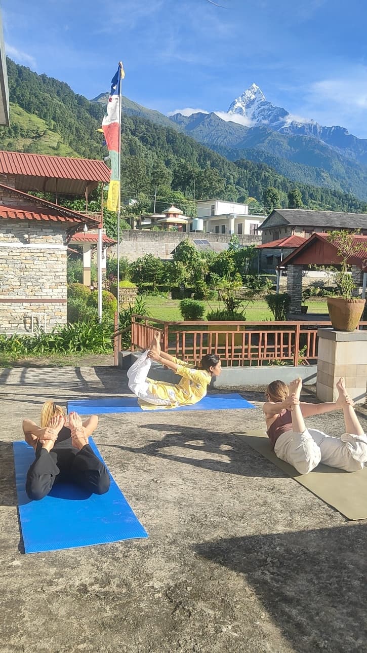 Morning yoga practice session with Himalayan mountain backdrop